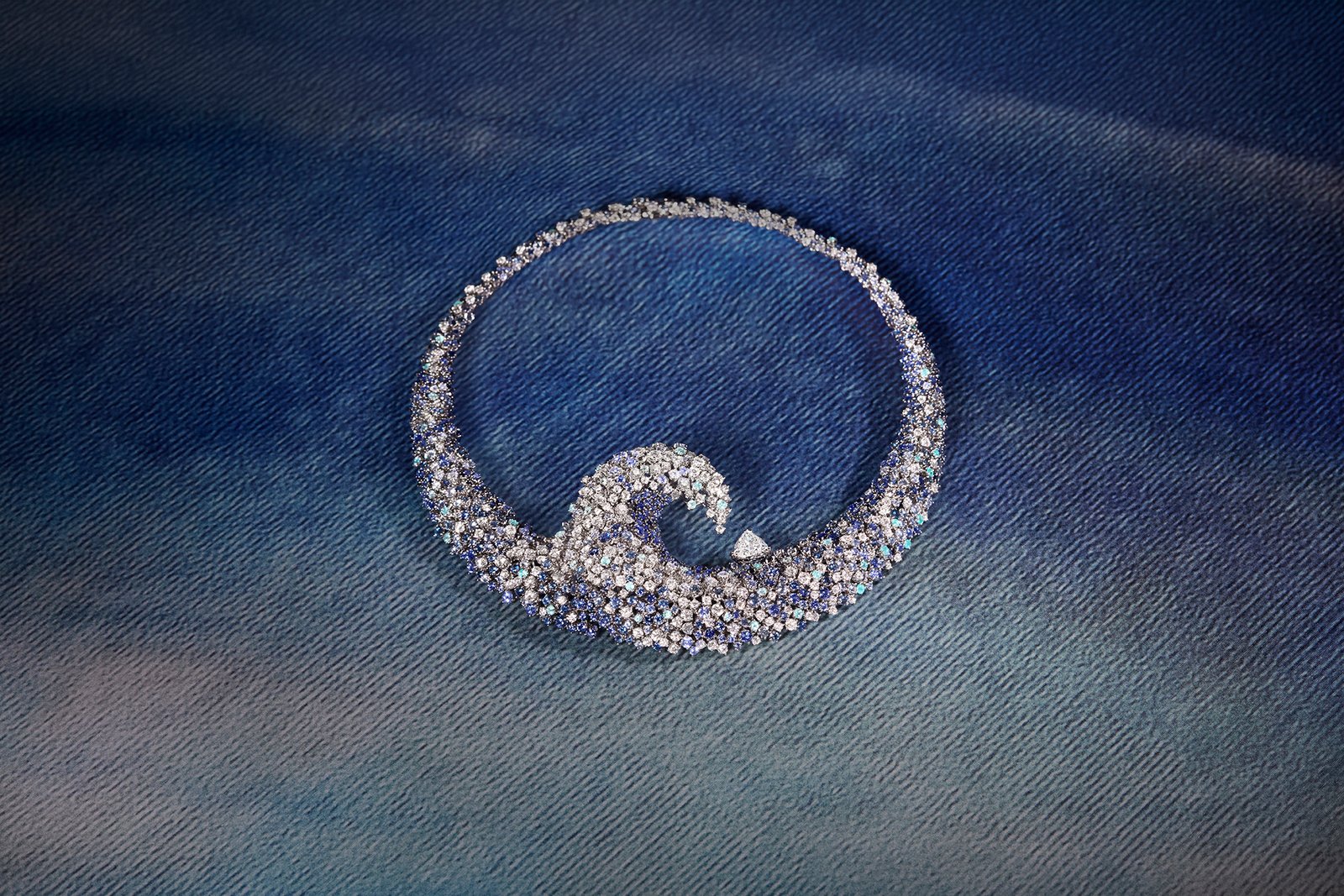 Damiani Impetuosa necklace sculpted as a blue gemstone wave