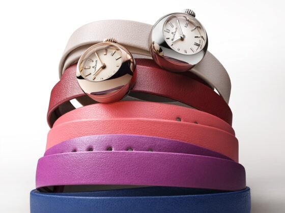 Two Blancpain Lady B watches arranged over colourful double-tour leather straps