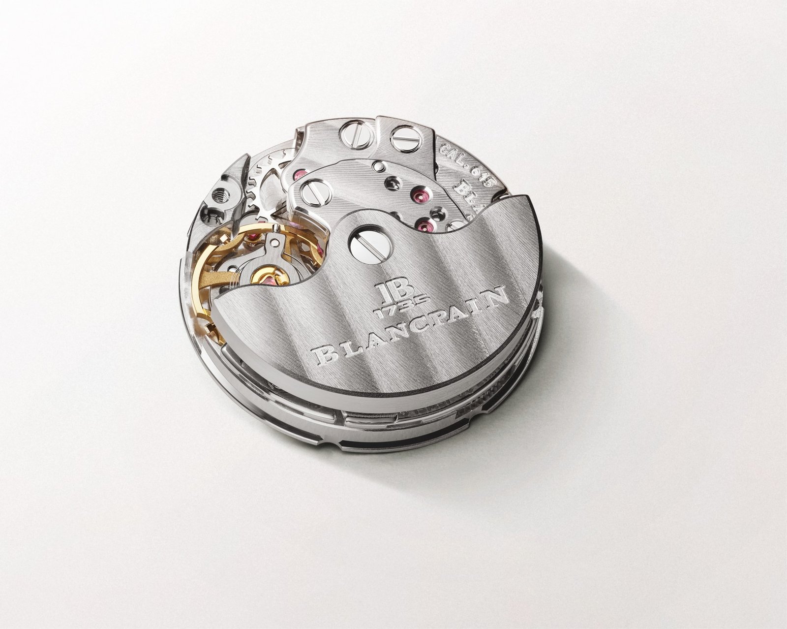 Close-up of Blancpain’s calibre 615, showing the signed rotor, visible balance and jewelled movement plates