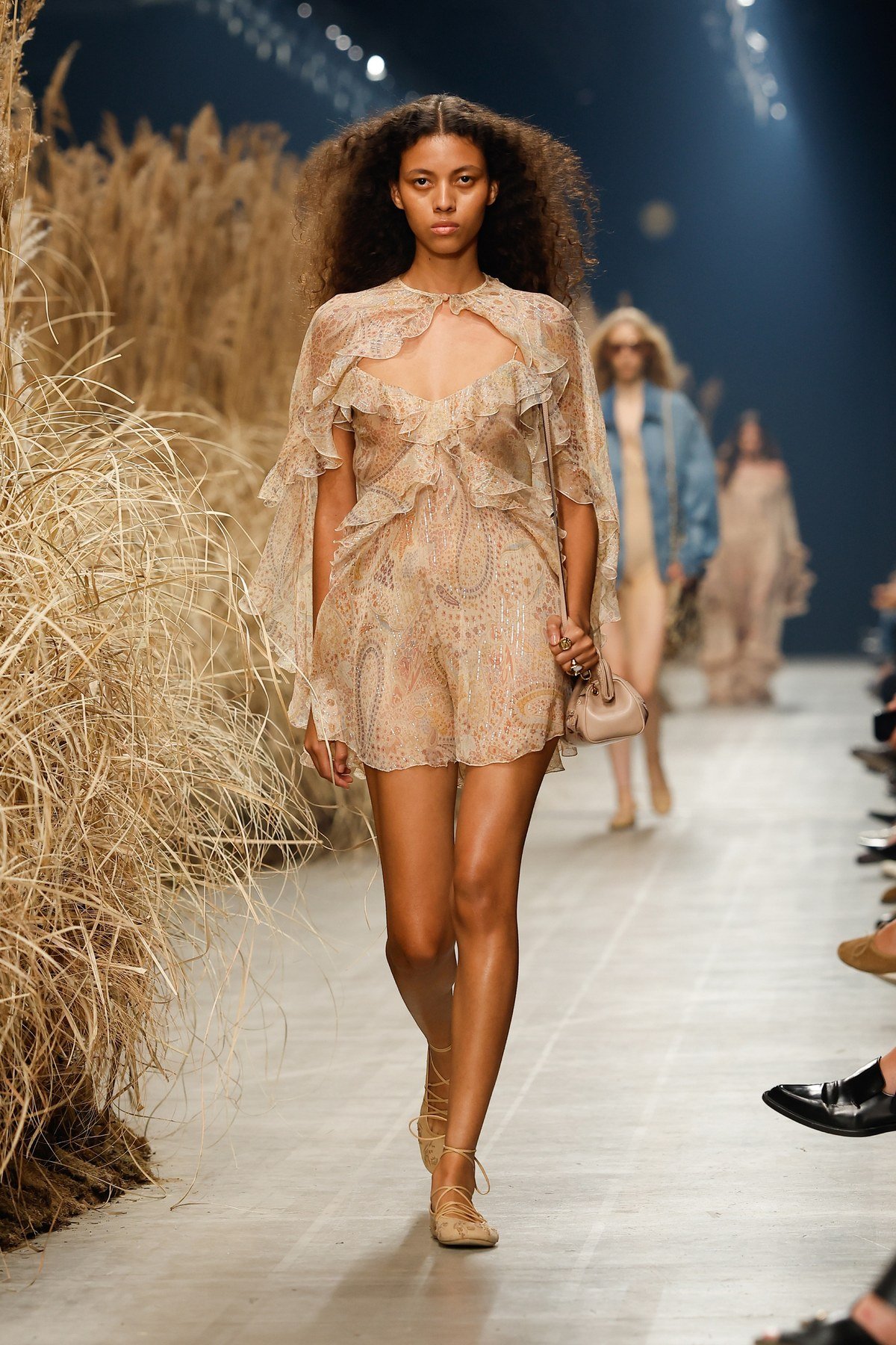 Etro spring–summer 2027 runway look with a short sheer patterned dress