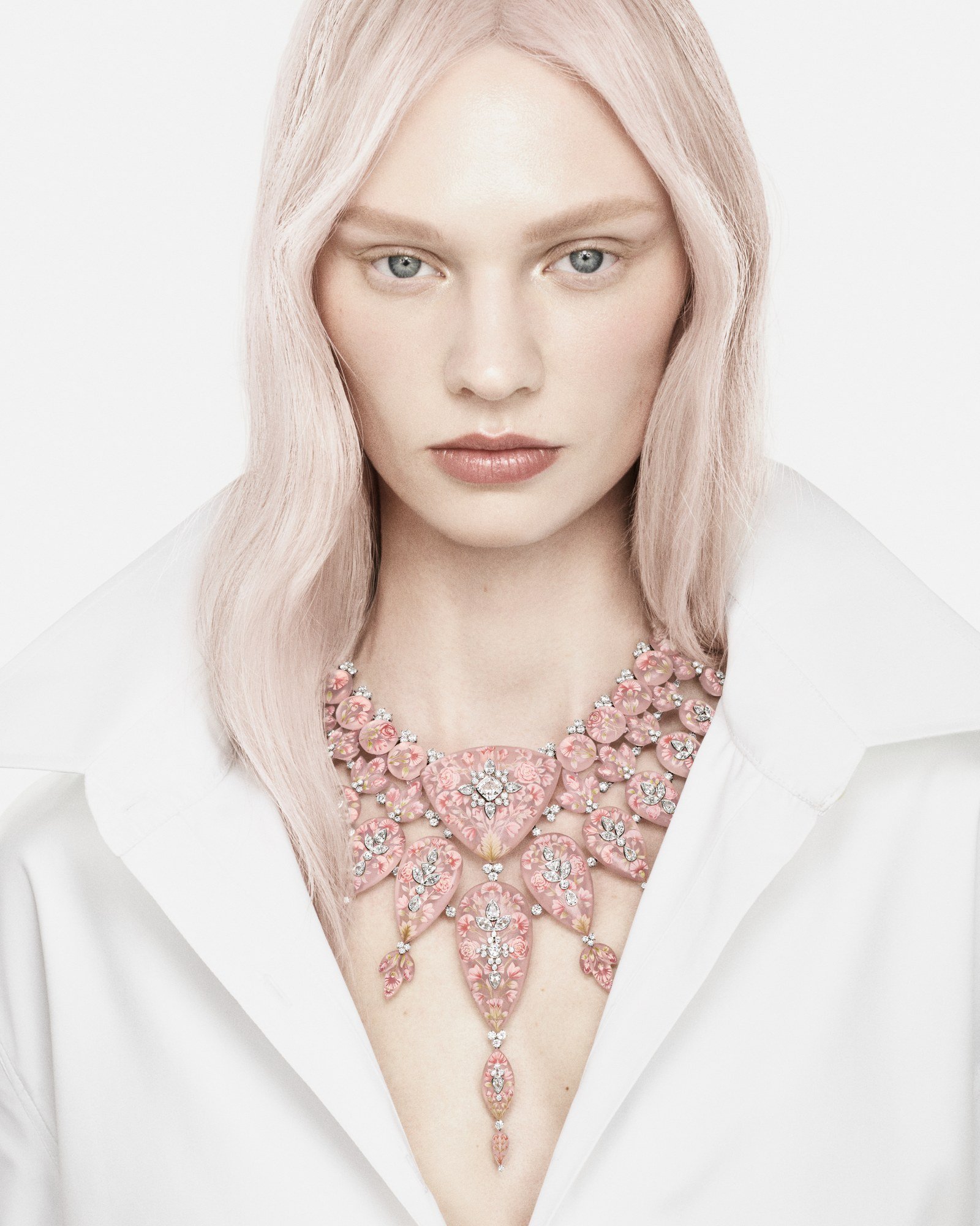The Flower necklace, whose rose-quartz stones are individually decorated with micro-painted floral motifs.