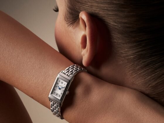 Jaeger-LeCoultre Reverso Origin with a steel bracelet on a model’s wrist