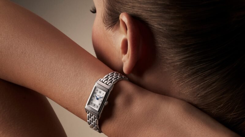 Jaeger-LeCoultre Reverso Origin with a steel bracelet on a model’s wrist