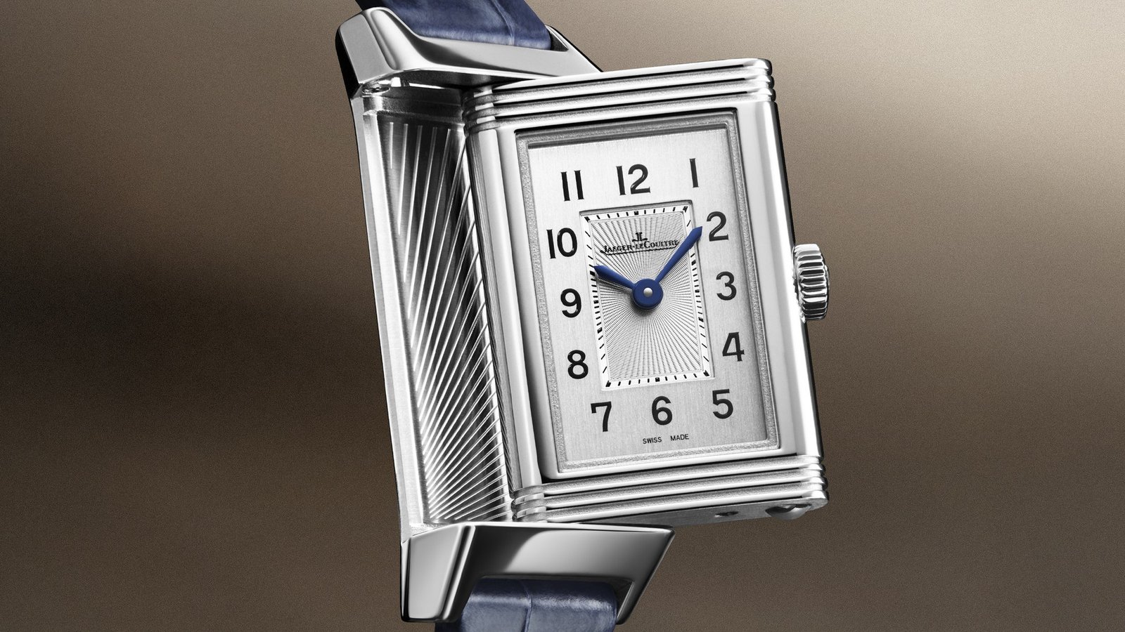 Jaeger-LeCoultre Reverso Origin dial with blue hands, Arabic numerals and a blue alligator strap