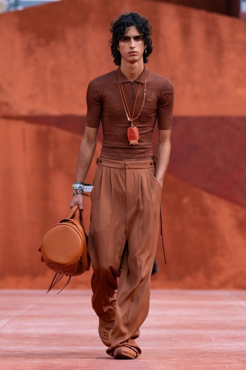 Clay-brown belted runway look at Lacoste Spring/Summer 2027