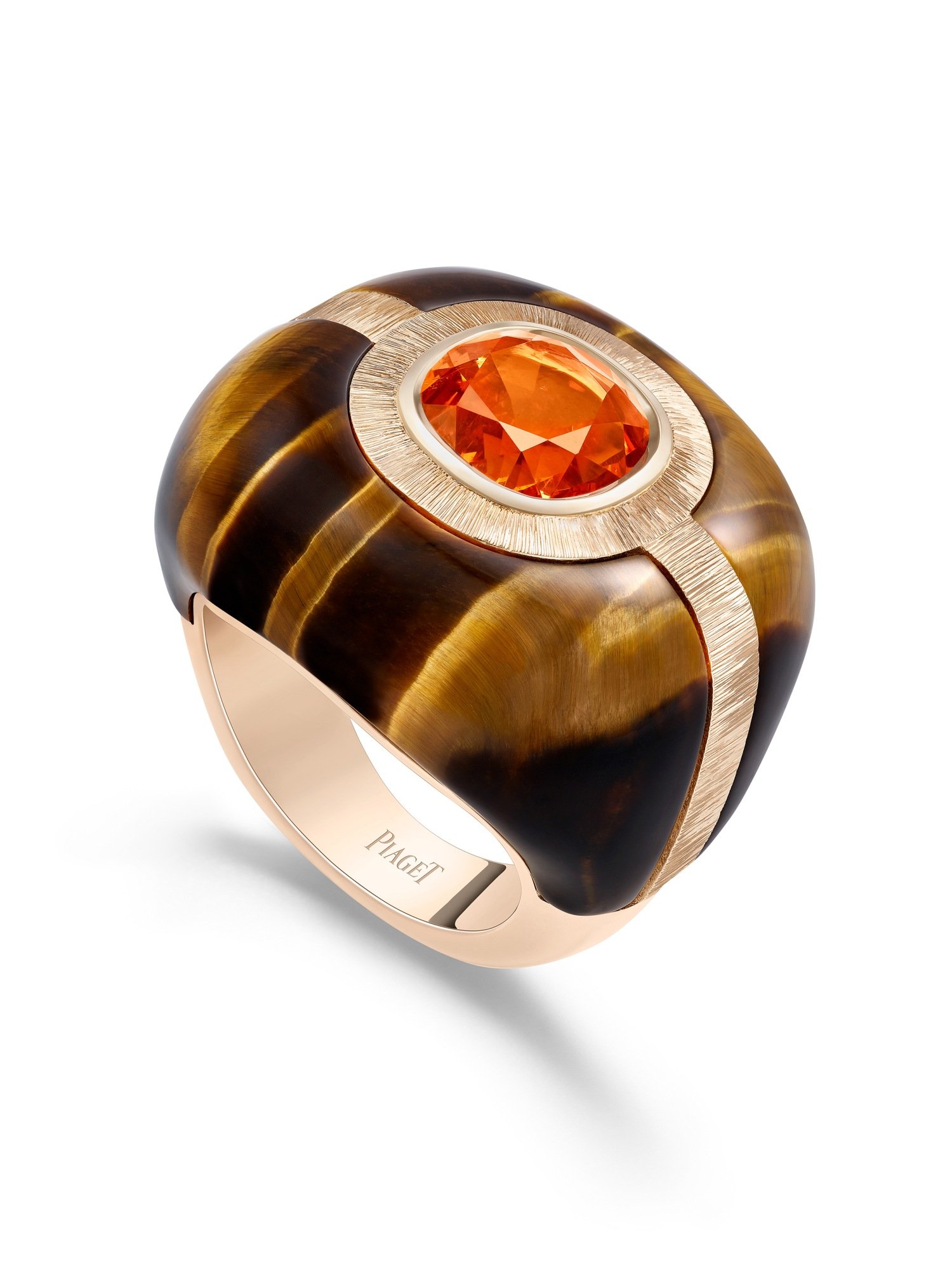 Flamboyant Links G34Q7600, a rose-gold and tiger’s-eye ring centred on a 6.42-carat cushion-cut spessartite garnet.