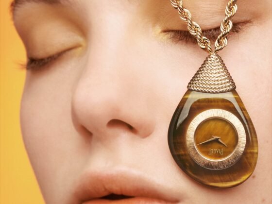 Piaget’s tiger’s-eye Swinging Pebbles pendant watch in yellow gold, photographed by Brigitte Niedermair.