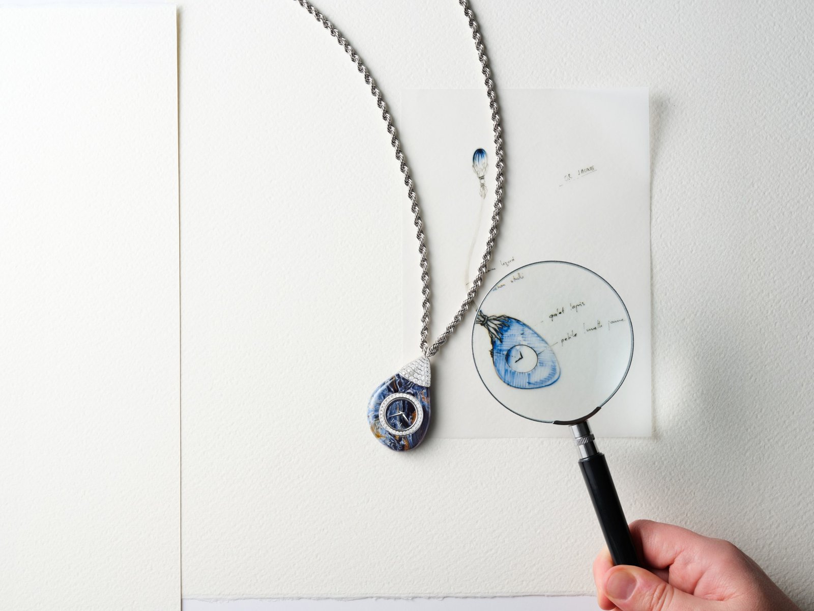 The pietersite and white-gold Swinging Pebbles G0A51409, with a diamond-set case.