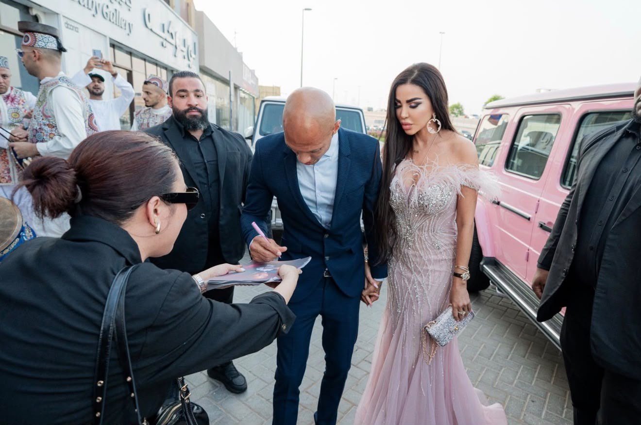 Guests arrive for the PINK MADI opening