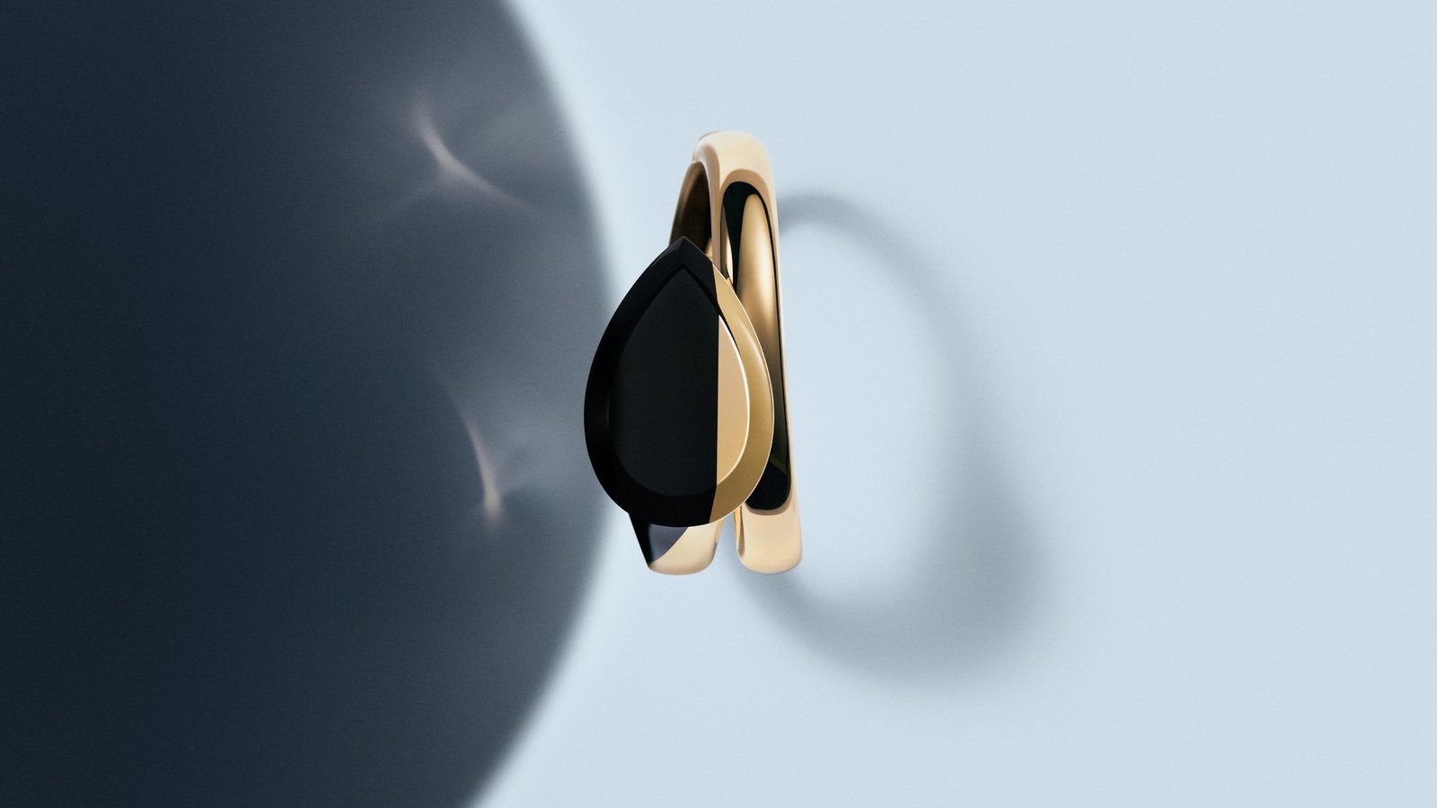 The sculptural Serpent Bohème bracelet brings onyx and polished yellow gold together in a bold double form.