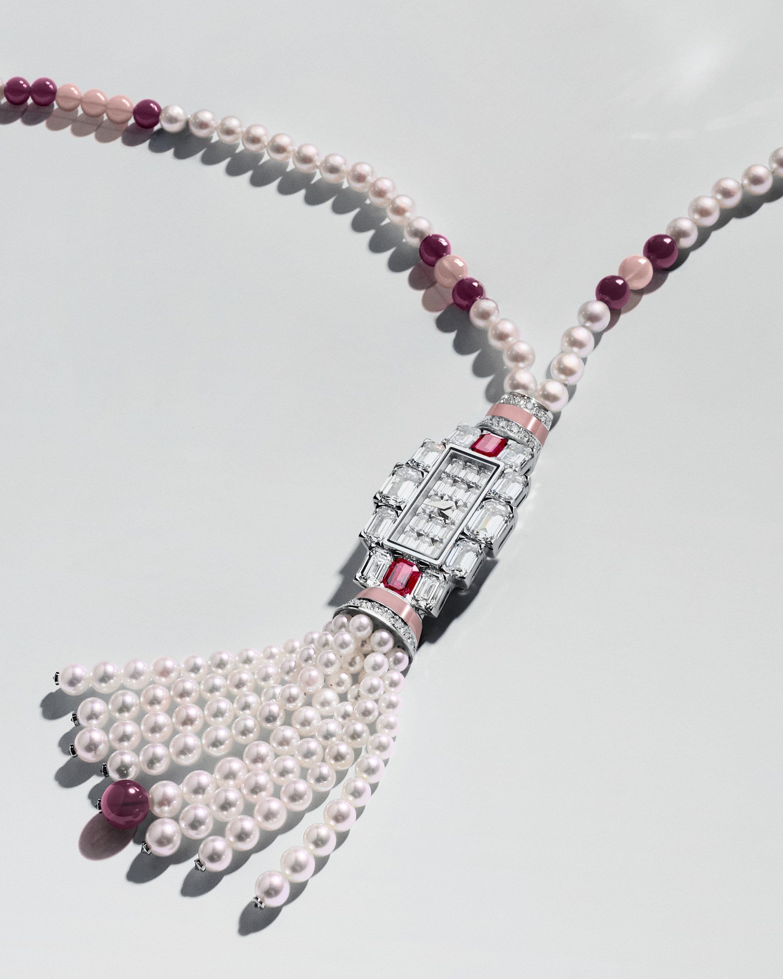 Ruby Grand Lady Kalla pendant watch on a pearl necklace with a tassel